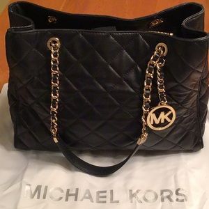 Michael Kors black leather handbag with gold